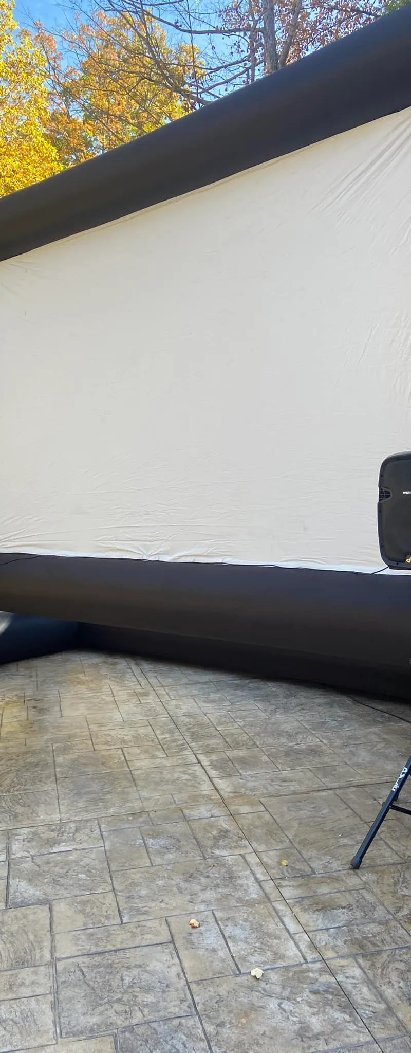 Inflatable movie screen with 4K projector and speakers